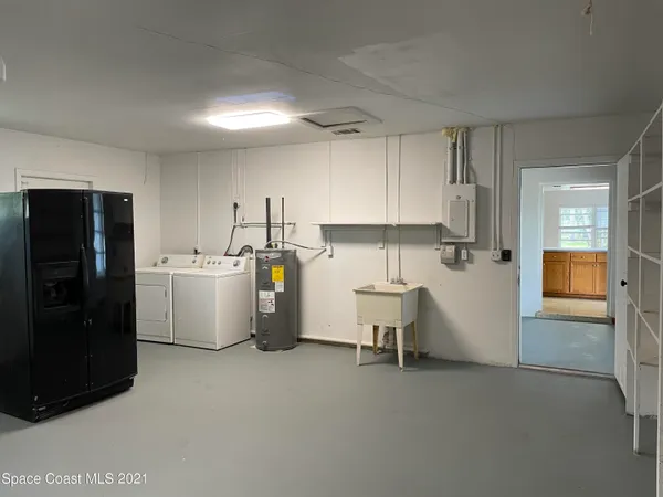 a view of a room with a garage