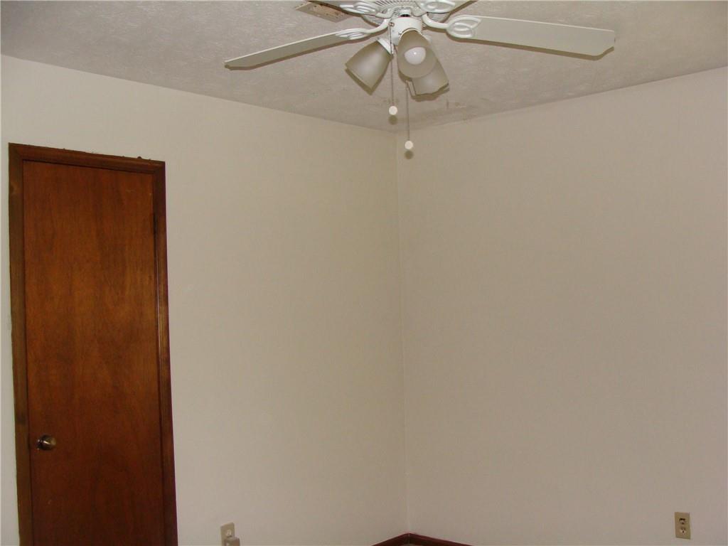 2331 Newgate Drive Decatur, GA 30035 - Photo 29 of 33 a view of a livingroom and a chandelier fan