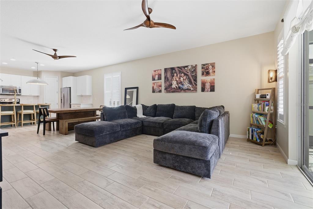 5232 Bentgrass Way Bradenton, FL 34211 - Photo 14 of 57 a living room with furniture and kitchen view