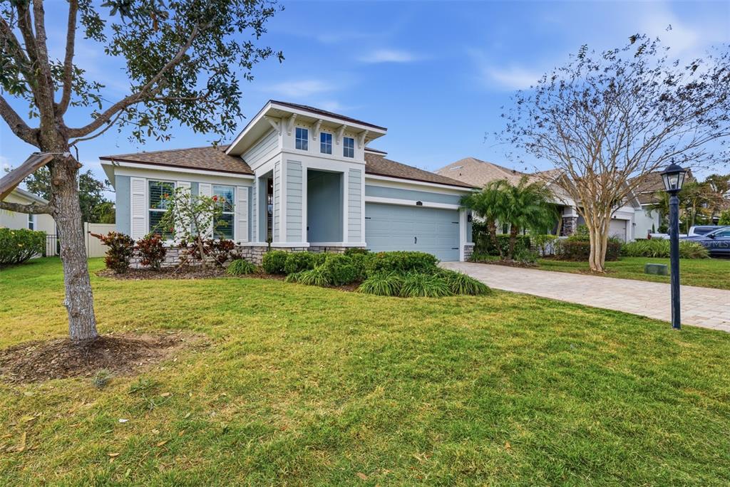 5232 Bentgrass Way Bradenton, FL 34211 - Photo 17 of 57 a view of a house with backyard and garden