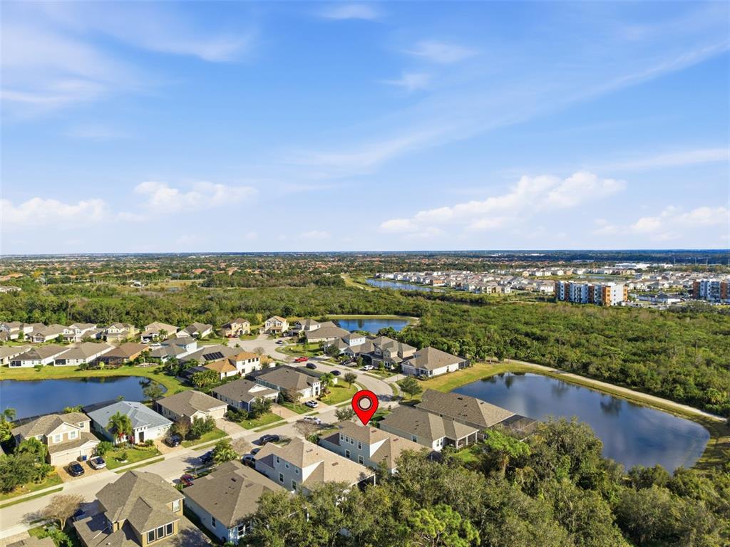 5232 Bentgrass Way Bradenton, FL 34211 - Photo 44 of 57 an aerial view of residential houses with outdoor space