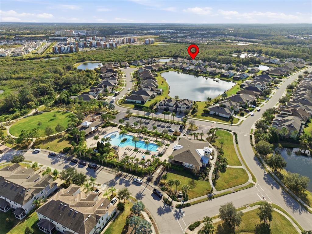 5232 Bentgrass Way Bradenton, FL 34211 - Photo 53 of 57 an aerial view of a house with a mountain