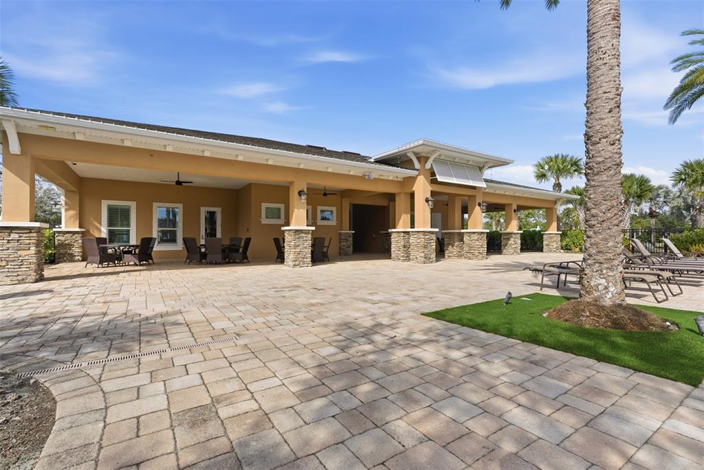 5232 Bentgrass Way Bradenton, FL 34211 - Photo 56 of 57 a view of a building with a yard