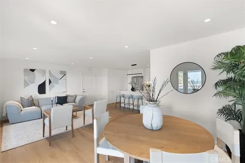 a bedroom with a bed and a chair