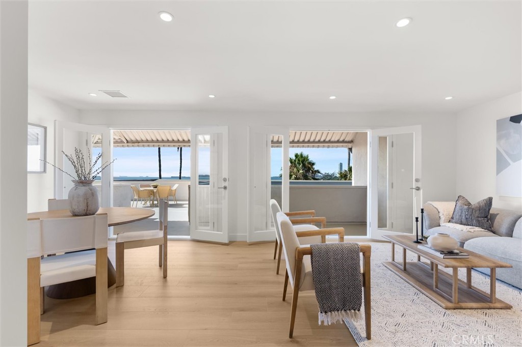 1200 East Ocean Boulevard, Unit 41 Long Beach, CA 90802 - Photo 9 of 35 a living room with furniture and wooden floor