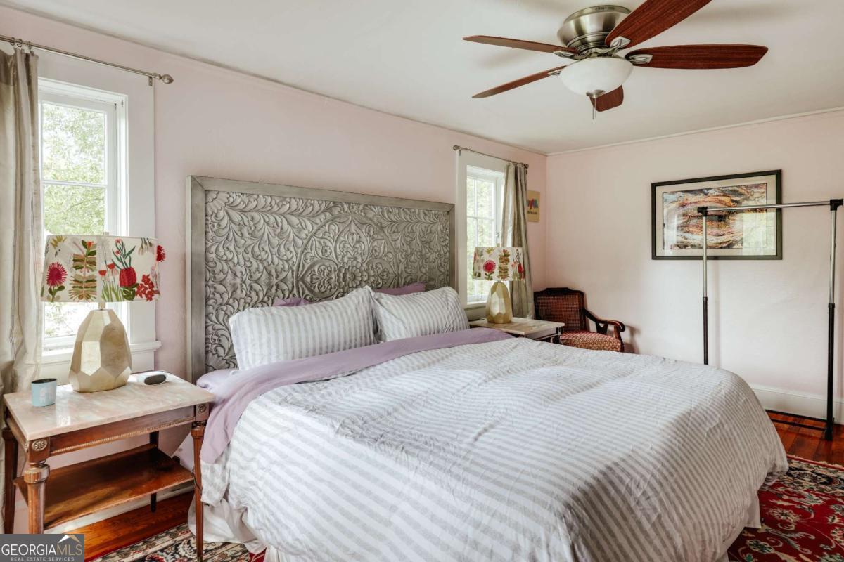 552 Cobb Street Athens, GA 30606 - Photo 24 of 55 a bedroom with a bed and a desk