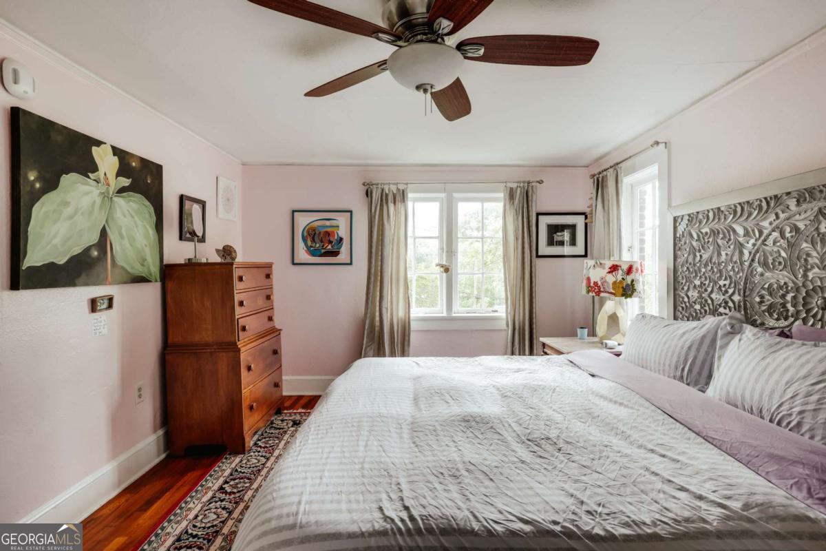 552 Cobb Street Athens, GA 30606 - Photo 25 of 55 a bedroom with a bed and a couch