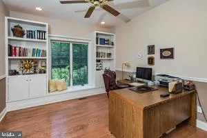 a workspace with furniture and window