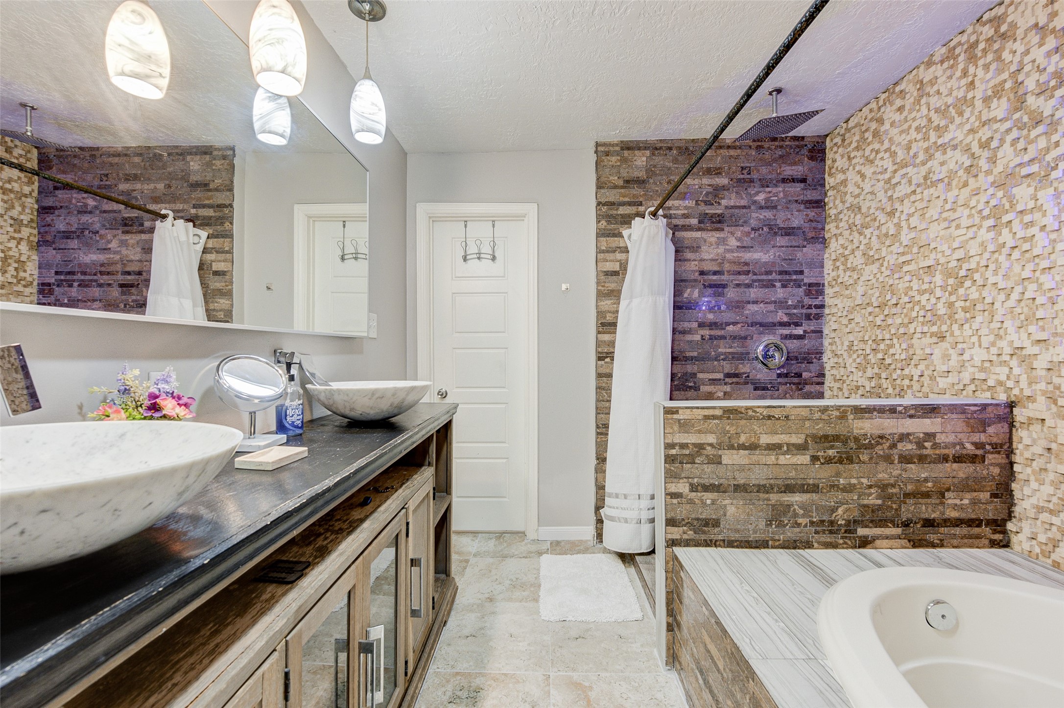 1207 Archer Street Houston, TX 77009 - Photo 27 of 30 a bathroom with a sink a vanity and a mirror