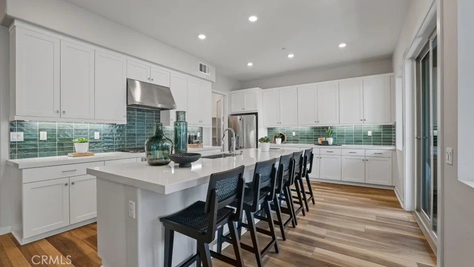 1005 Walnut Terrace Montebello, CA 90640 - Photo 1 of 37 a kitchen with a table and chairs in it