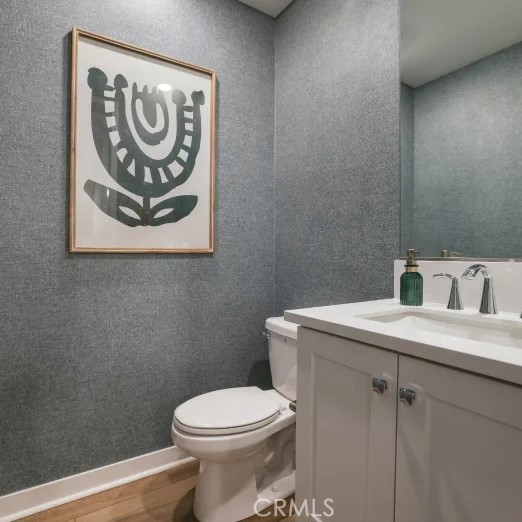1005 Walnut Terrace Montebello, CA 90640 - Photo 13 of 37 a bathroom with a toilet sink and vanity