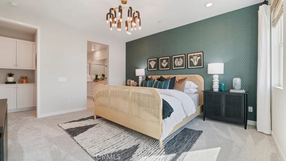 1005 Walnut Terrace Montebello, CA 90640 - Photo 15 of 37 a bed room with a bed and a chandelier