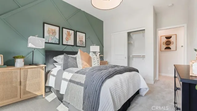 a bed room with a bed and a table