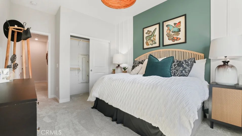 1005 Walnut Terrace Montebello, CA 90640 - Photo 23 of 37 a bedroom with a bed and painting on the wall