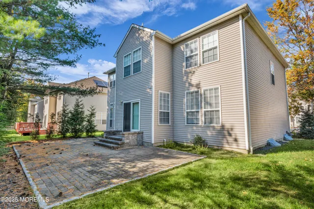 a front view of house with yard