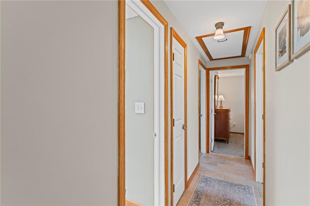 56 Regola Drive Irwin, PA 15642 - Photo 14 of 43 a view of a hallway with wooden floor and entryway