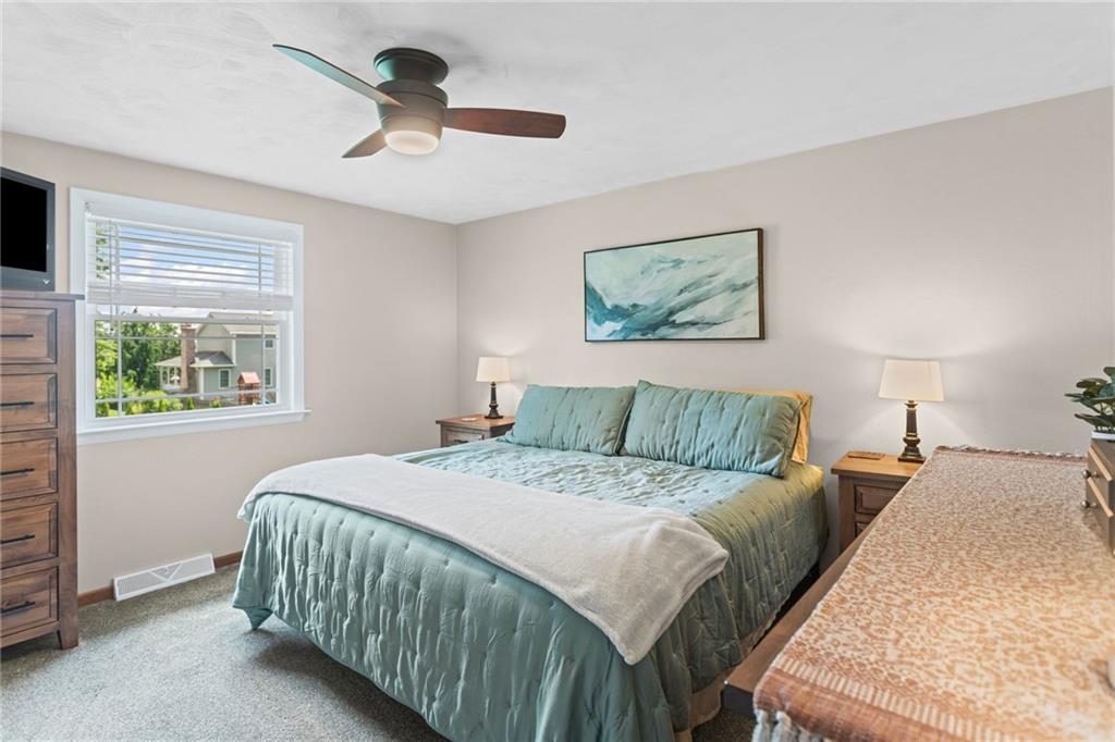 56 Regola Drive Irwin, PA 15642 - Photo 15 of 43 a bed sitting in a bedroom next to a window