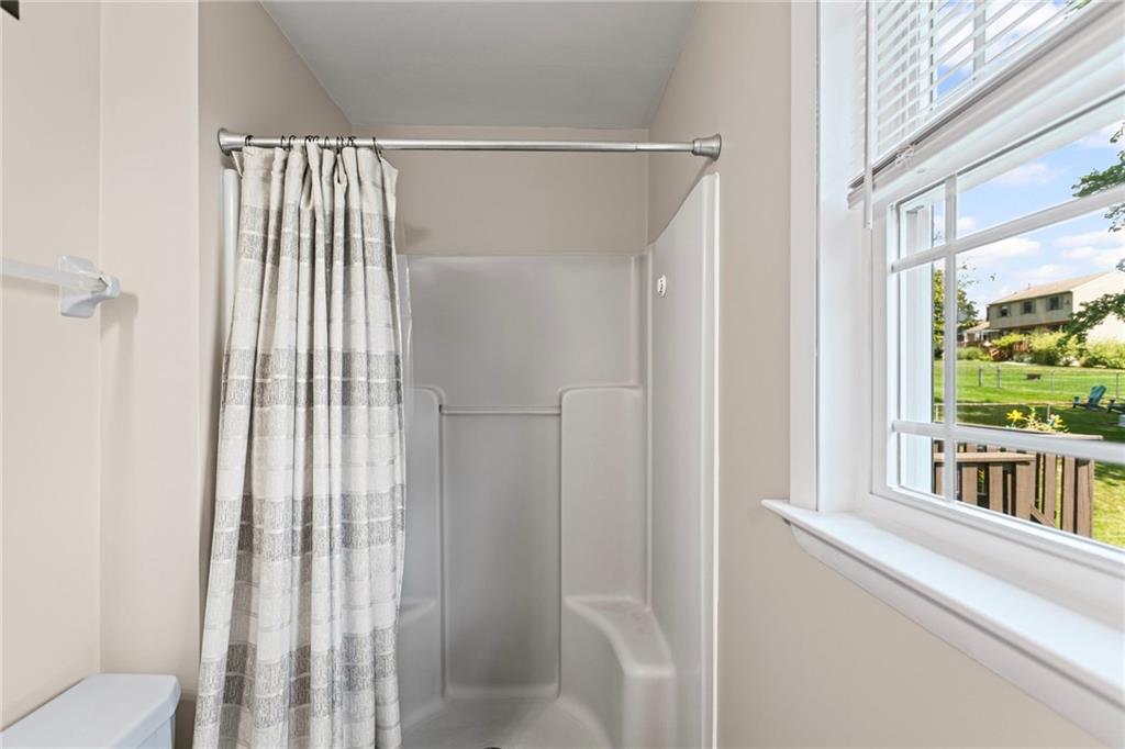 56 Regola Drive Irwin, PA 15642 - Photo 19 of 43 a view of a bathroom with a glass door