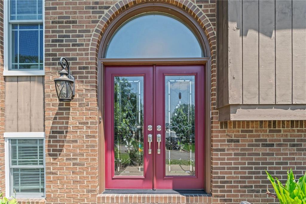 56 Regola Drive Irwin, PA 15642 - Photo 3 of 43 a view of a brick house with a windows
