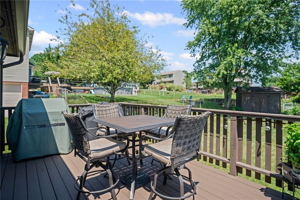 56 Regola Drive Irwin, PA 15642 - Photo 35 of 43 a view of a chairs and table on the deck