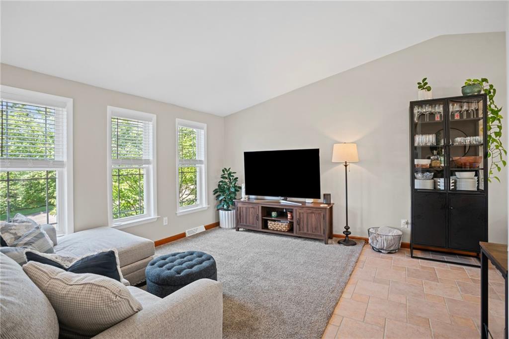 56 Regola Drive Irwin, PA 15642 - Photo 4 of 43 a living room with furniture and a flat screen tv