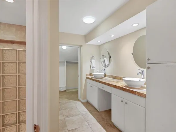 a bathroom with a shower and a toilet