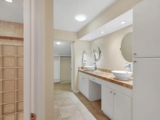 a bathroom with a shower and a toilet