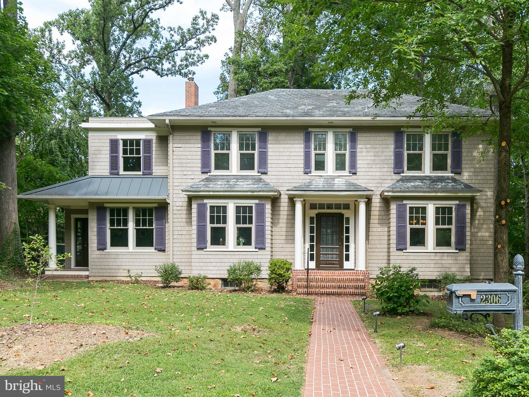 2306 Ken Oak Road Baltimore, MD 21209 - Photo 1 of 30 front view of a house with a yard