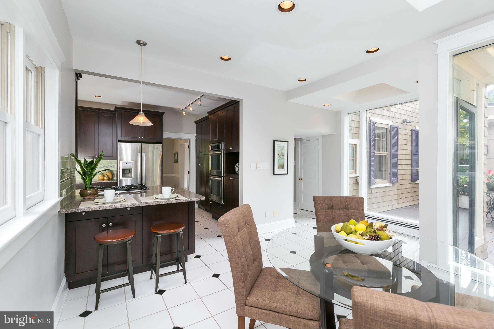 2306 Ken Oak Road Baltimore, MD 21209 - Photo 13 of 30 a view of a dining room and livingroom