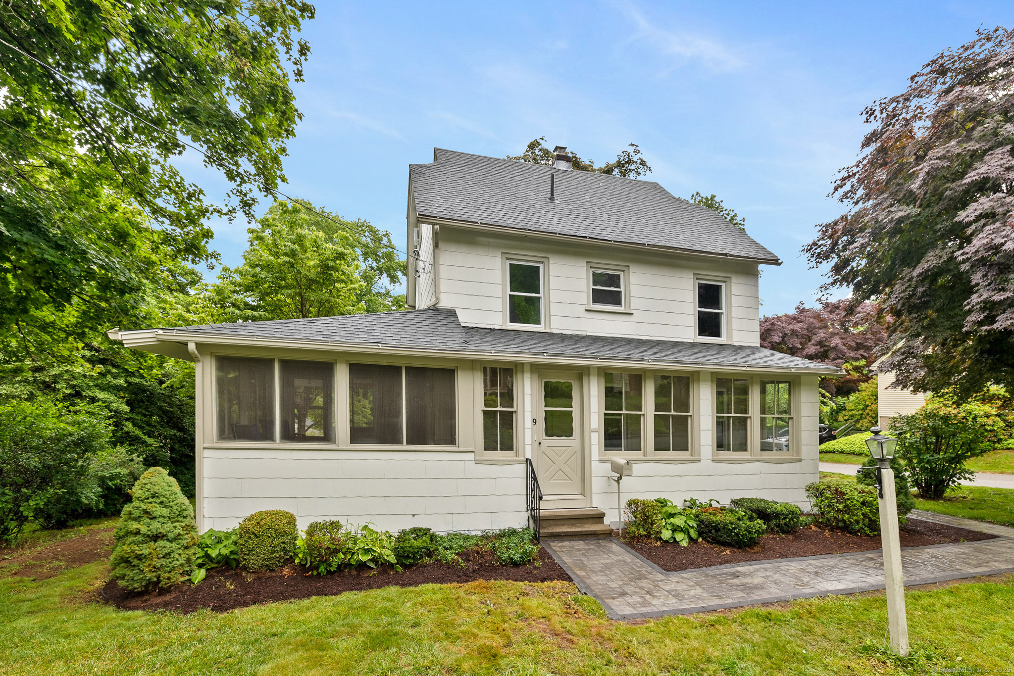 9 Village Street Manchester, CT 06040 - Photo 1 of 1 a house that has a lot of windows in it