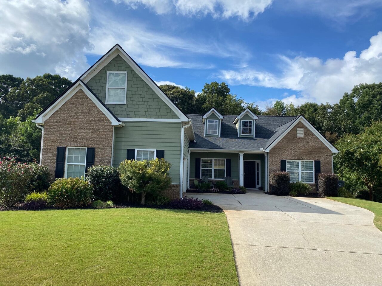 315 Jefferson Boulevard, Unit 15 Jefferson, GA 30549 - Photo 1 of 1 a front view of house with yard and green space
