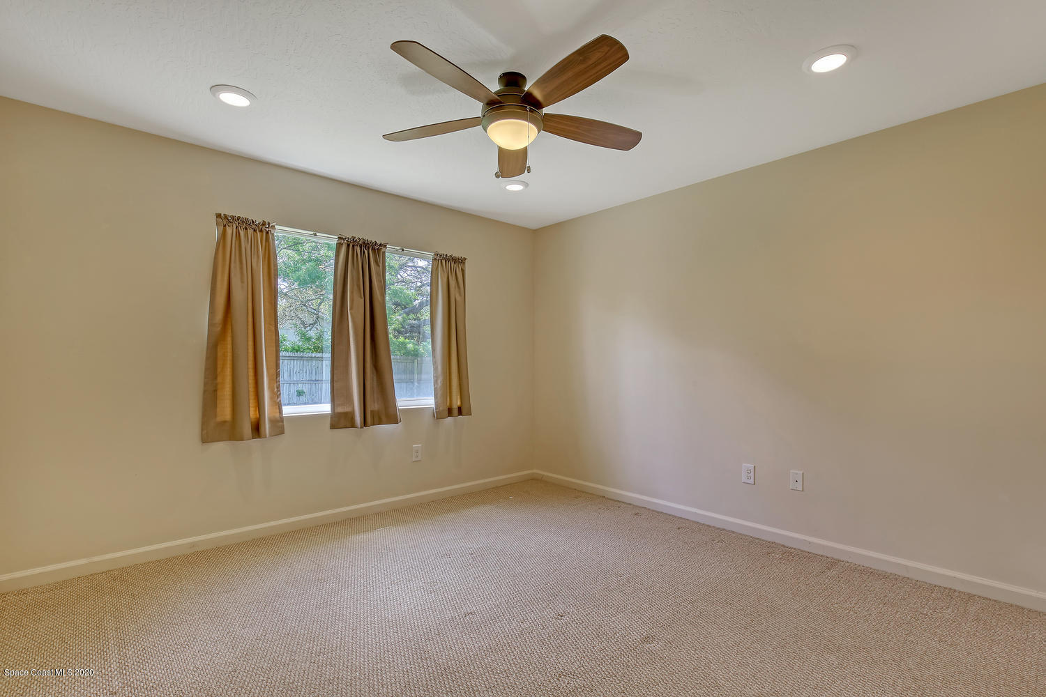930 Bacon Circle Northeast Palm Bay, FL 32905 - Photo 19 of 33 Master Bedroom