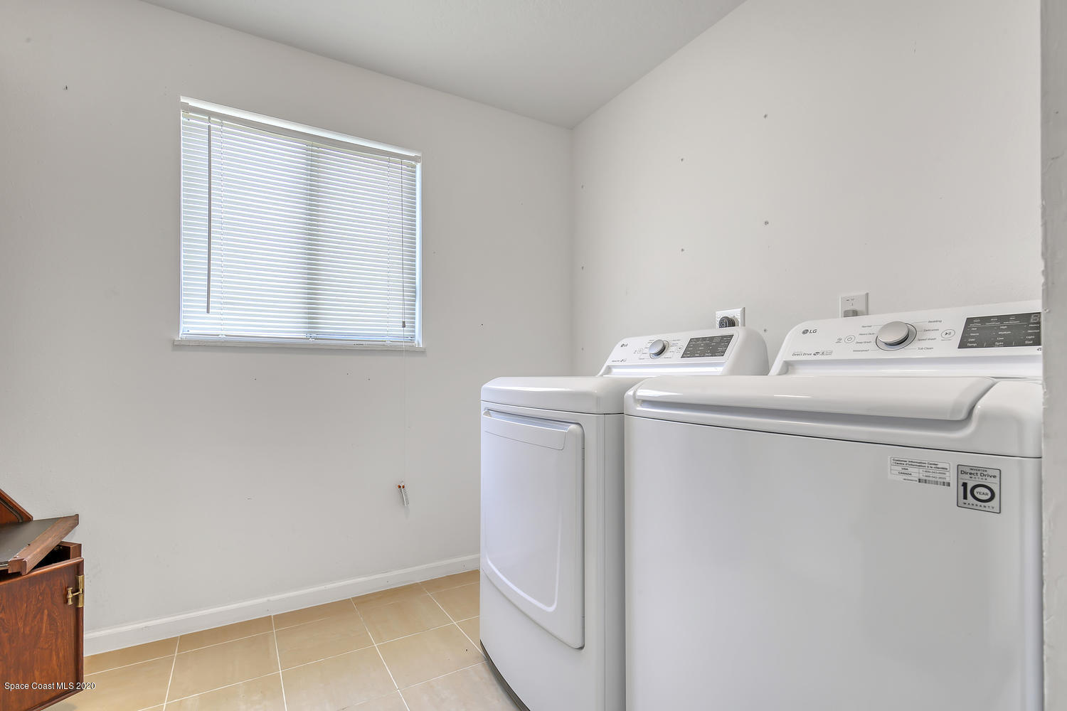 930 Bacon Circle Northeast Palm Bay, FL 32905 - Photo 23 of 33 LAUNDRY ROOM