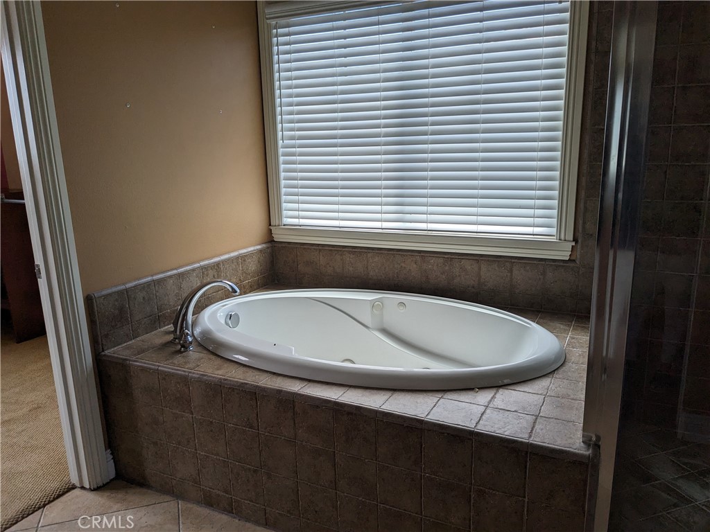 36071 Horseshoe Court Wildomar, CA 92595 - Photo 7 of 8 a bathroom with a sink and a window