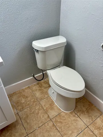 a bathroom with a toilet