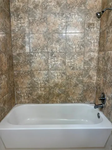 a bathroom with a bathtub