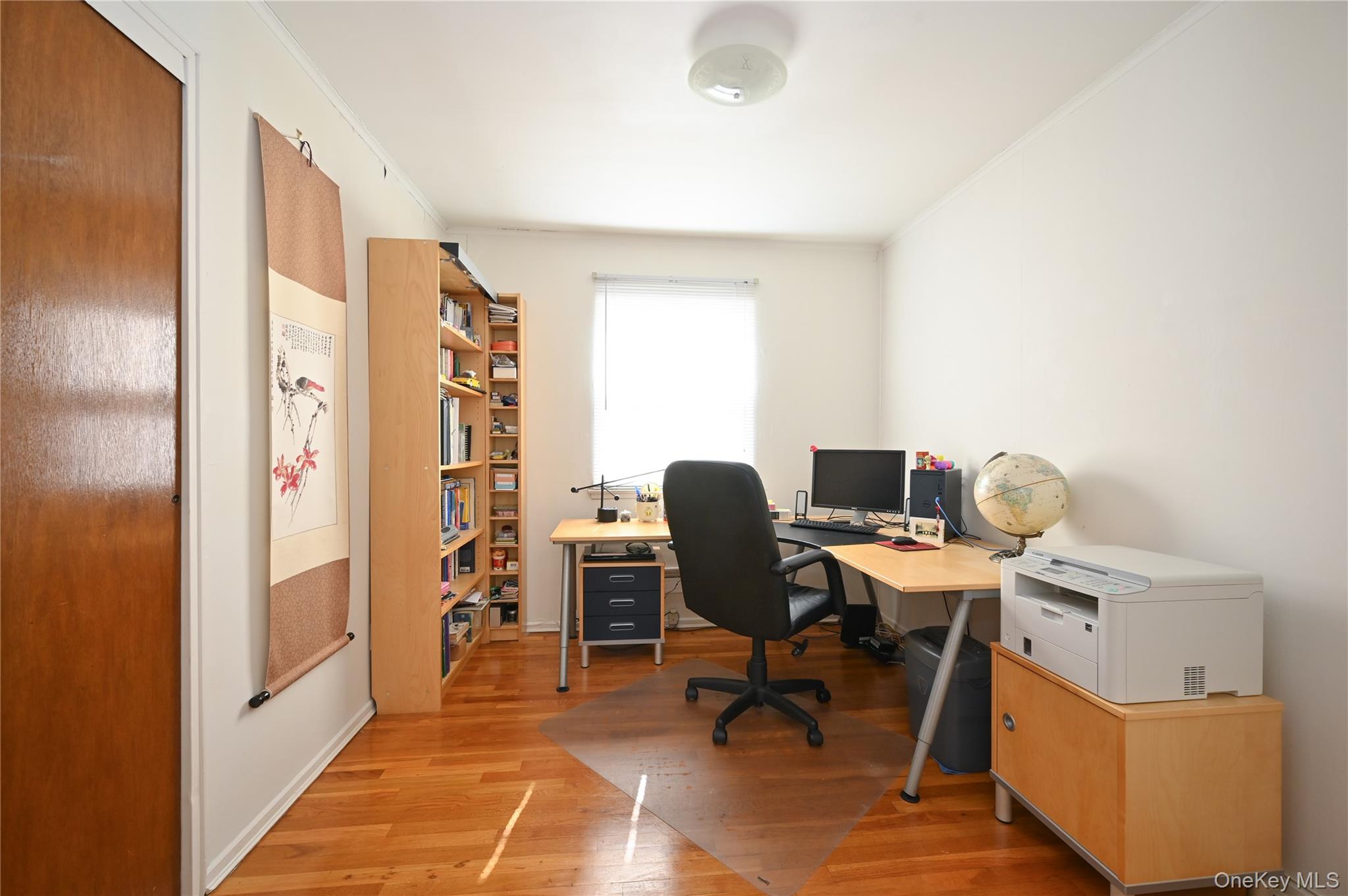 28-30 210th Street Queens, NY 11360 - Photo 10 of 19 Office area featuring light wood-type flooring and crown molding
