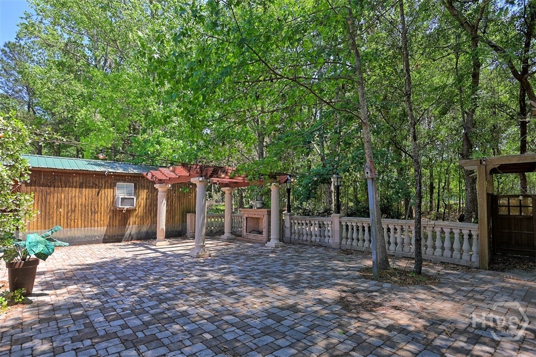 113 Country Lane Pooler, GA 31322 - Photo 12 of 51 Back brick-paver patio