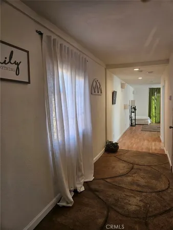 a room with a bed and a window