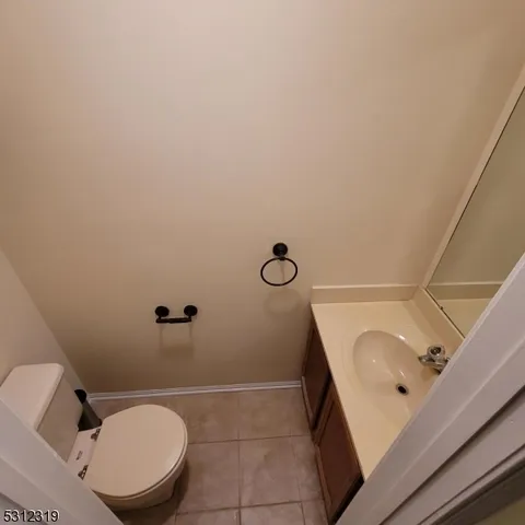 a bathroom with a toilet and a sink