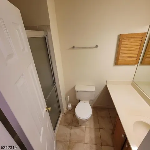 a bathroom with a sink and toilet