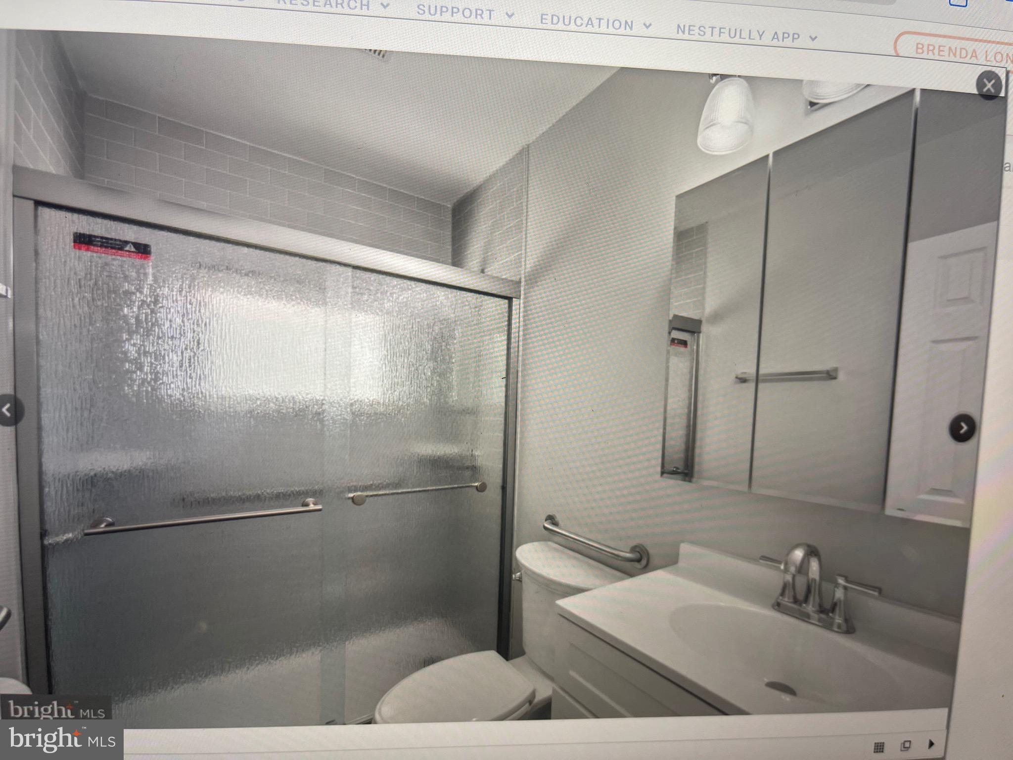 8608 Inwood Road Windsor Mill, MD 21244 - Photo 11 of 20 a bathroom with a sink and a mirror