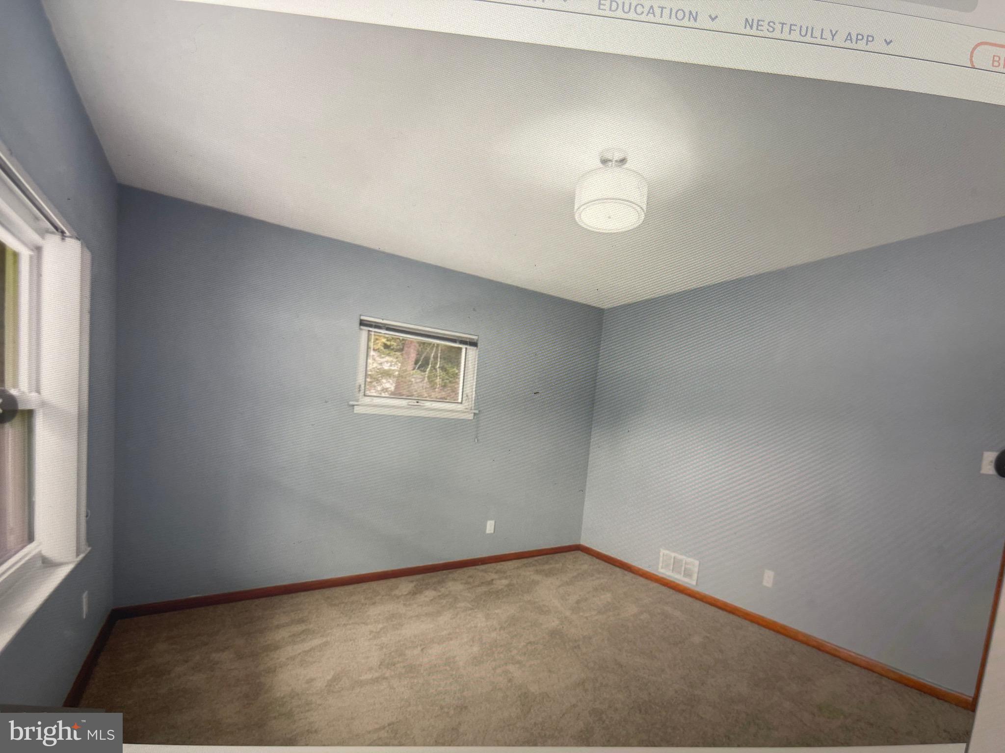 8608 Inwood Road Windsor Mill, MD 21244 - Photo 14 of 20 an empty room with a window