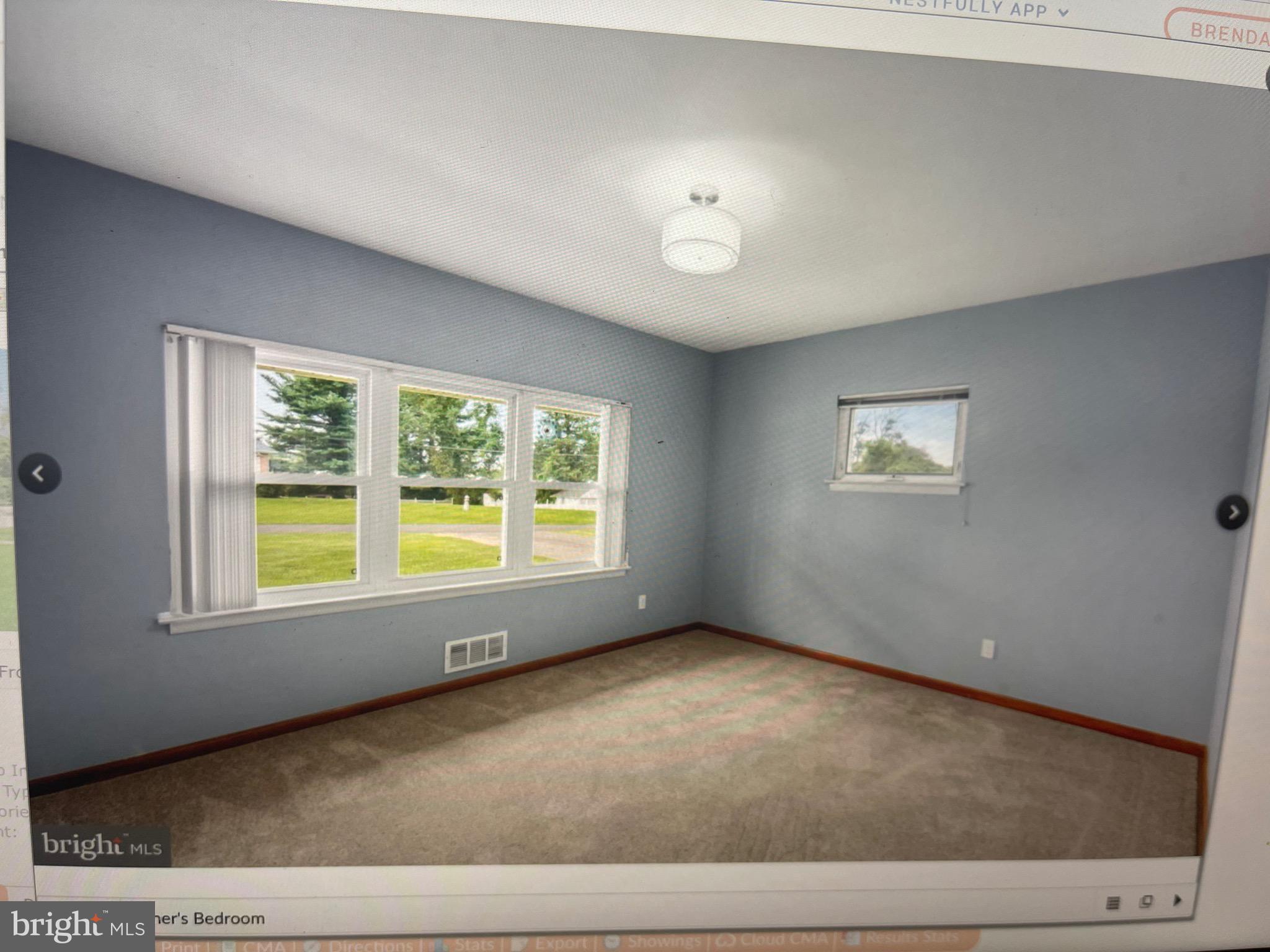 8608 Inwood Road Windsor Mill, MD 21244 - Photo 15 of 20 a view of an empty room with a window