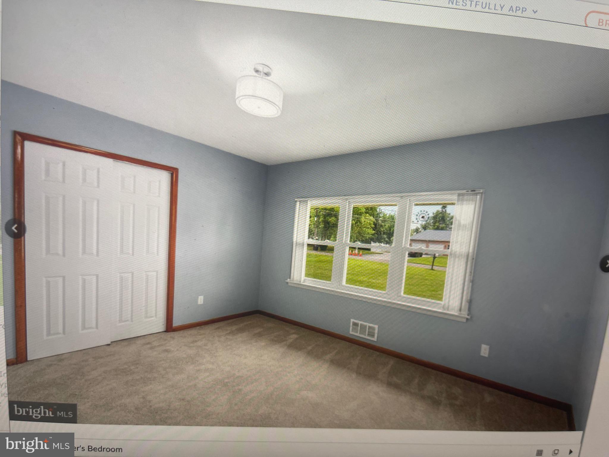 8608 Inwood Road Windsor Mill, MD 21244 - Photo 16 of 20 an empty room with a window