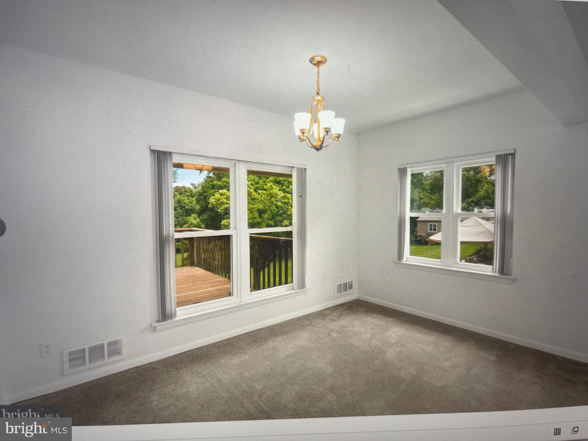 8608 Inwood Road Windsor Mill, MD 21244 - Photo 20 of 20 a view of an empty room with a window
