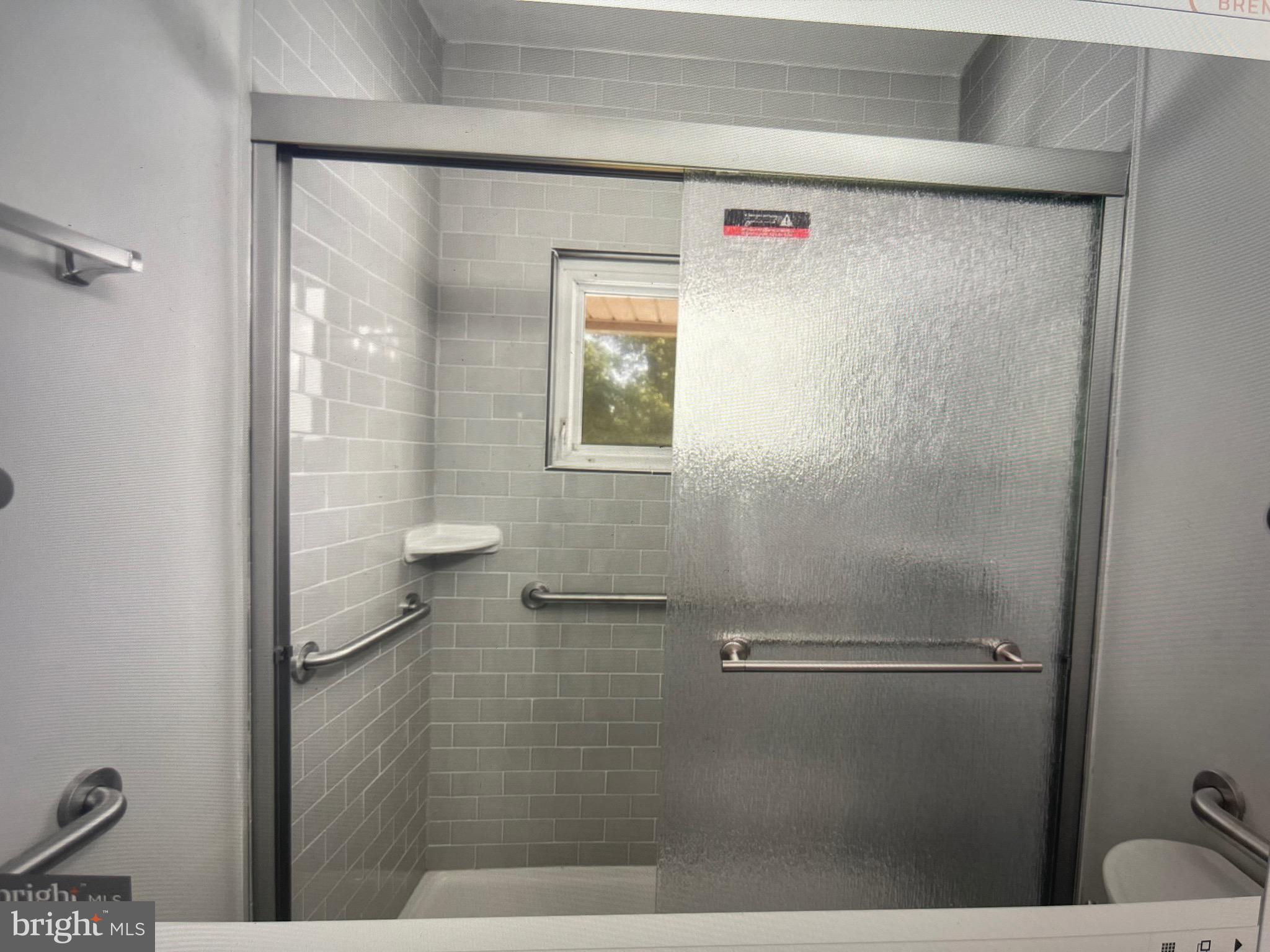 8608 Inwood Road Windsor Mill, MD 21244 - Photo 10 of 20 a bathroom with a shower