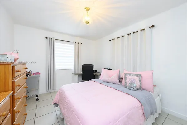 a very nice looking room with a large window