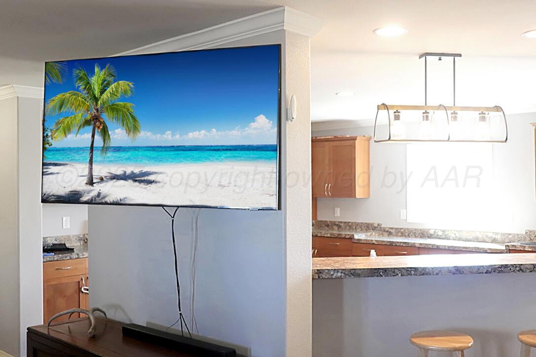 735 Wagon Mound Highway Other - Not In List, NM 87743 - Photo 21 of 39 a view of living room with furniture and screen