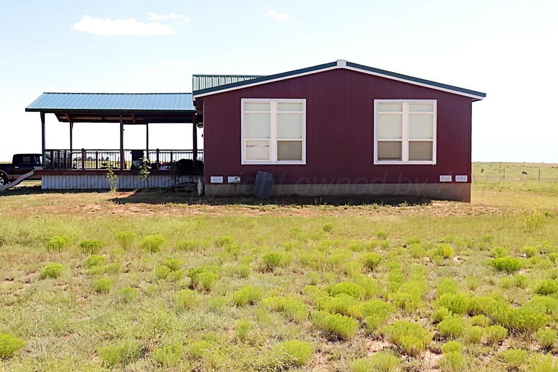 735 Wagon Mound Highway Other - Not In List, NM 87743 - Photo 5 of 39 a view of swimming pool of the house with yard